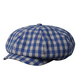 Classic blue and grey plaid newsboy cap in breathable linen blend with 8-panel structure
