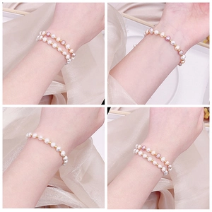 Exquisite freshwater pearl and jade bracelet with gold beads shown in various styles