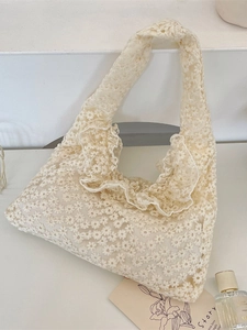 Cream lace tote bag with daisy embroidery and ruffle trim for casual summer styling