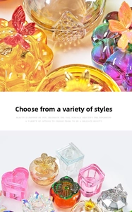 Close-up of various gradient glass nail art crystal cups and jewelry storage containers