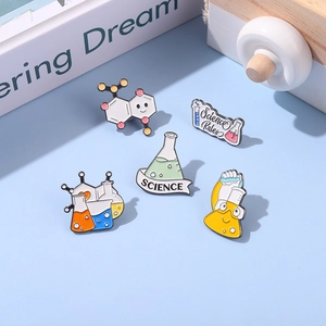 5-piece science enamel pin set featuring flasks, molecular models, and chemistry symbols