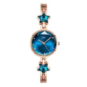 Elegant rose gold watch with faceted navy blue dial and starfish crystal accents