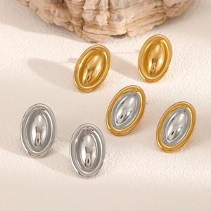 Polished minimalist oval stud earrings in gold, silver and mixed tones on stone base