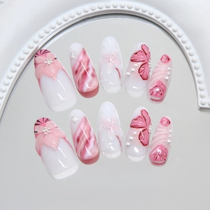 Künstliche Nägel mit rosa 3D-Lilien, Perlen und Katzenaugen-Effekt im 10er-Set-Design