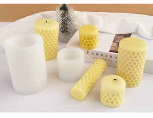 Detailed macro view of honeycomb texture silicone candle mold and DIY finished products