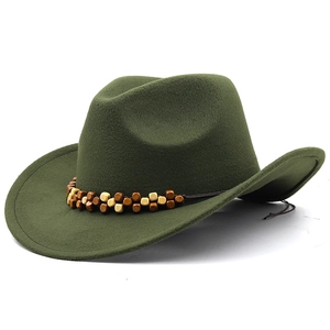Detail of olive green wool felt cowboy hat featuring ethnic double-row wooden bead band