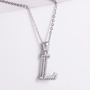 Silver stainless steel letter L necklace with sparkling rhinestones on a slim chain