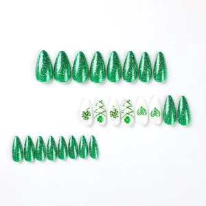 Green St. Patrick's Day press-on nails with shamrock patterns and glitter finish