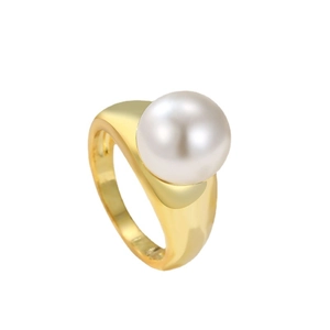 Elegant gold geometric ring featuring a large lustrous pearl on a minimalist metal band
