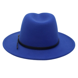 Close-up of royal blue fedora hat featuring a black leather band and metal buckle detail