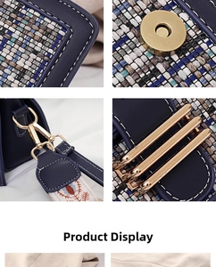 Detail of navy blue PU leather and woven fabric crossbody bag with gold hardware