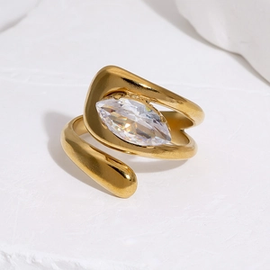 Detail showing an 18k gold plated stainless steel ring with a marquise cut zircon stone