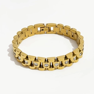 Detailed macro view of 18K gold plated stainless steel watch link bracelet with zircons