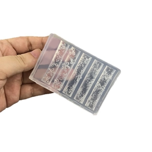 Transparent silicone nail art mold with 3D embossed floral patterns and vine designs