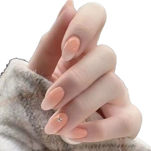 Elegante Press-on-Nägel mit pfirsichfarbenem Verlauf, Strassverzierung und Oval-Design