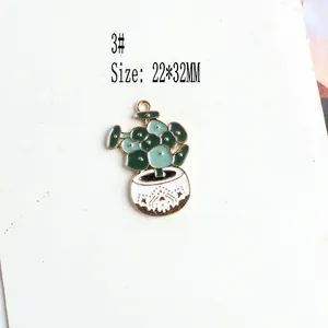 Detail of green succulent plant enamel charm in gold base for DIY jewelry, 22x32mm