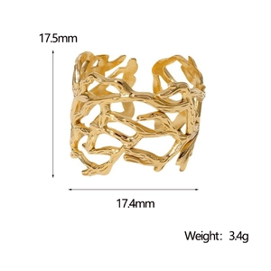 Detail view of irregular hollow gold ring with branch design showing 17.5mm dimensions