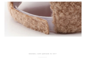 Detail of adjustable velcro strap on caramel teddy fleece baseball cap with soft texture