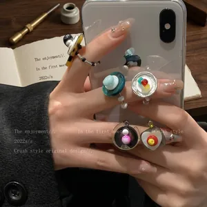 Retro beaded resin rings in mixed colors for a trendy layered stackable jewelry look