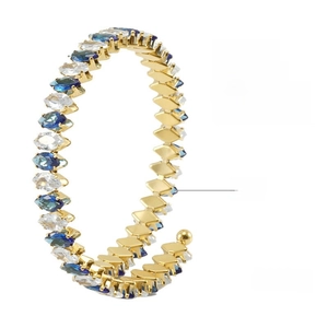 Detail of 18K gold-plated stainless steel cuff featuring blue and white marquise zircon stones