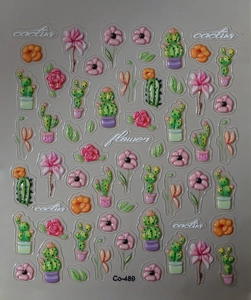 Detailed macro view of 5D embossed cactus and flower nail stickers with 3D relief texture