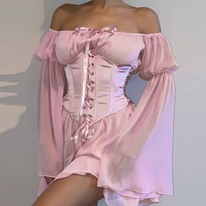 Close-up of pink off-the-shoulder dress featuring waist ties and satin chiffon texture