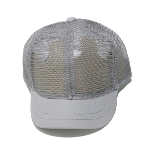 Close-up of the light gray breathable mesh structure and fabric texture on a trucker hat