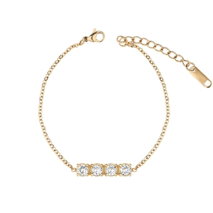 Detailed close-up of gold titanium steel bracelet with sparkling round clear zircons