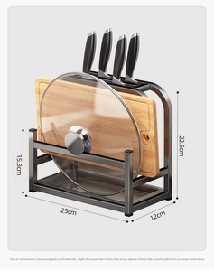 Detail of grey kitchen knife rack with integrated cutting board stand and drip tray