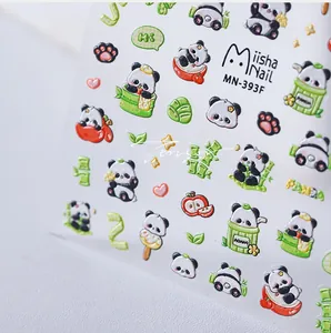 Macro view of 3D embossed nail stickers featuring cute pandas and bamboo patterns