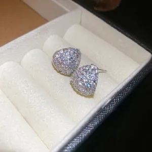 Sparkling S925 silver heart shaped stud earrings with cubic zirconia in white jewelry box