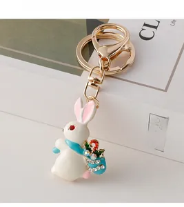 Detail of cute rabbit keychain with colorful enamel and sparkling crystal accents