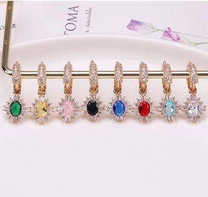 Detailed display of 8 multi-color sunflower pendants with gold plating and zircons
