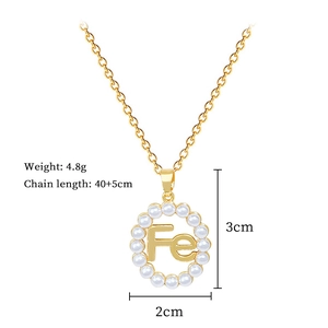 Detail of Fe letter gold necklace showing pearl inlay with weight and size specifications
