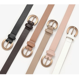 Five assorted colors of slim women's belts with golden D-shaped buckles on white background