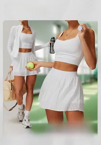 Detailed view of women's white tennis set featuring pleated skirt and racerback tank top