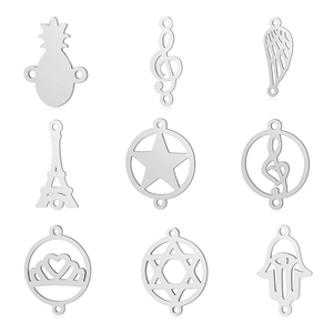 Set of 9 stainless steel pendants including pineapple, wing, and musical note shapes