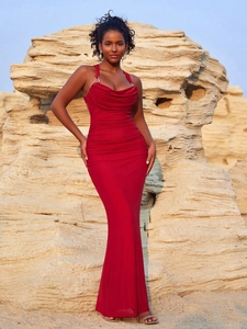 Elegant burgundy backless evening dress with ruched details and metal ring accents