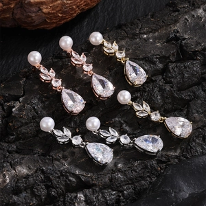 Classic leaf drop earrings with pearls and pear-cut zircons in gold, rose gold and silver