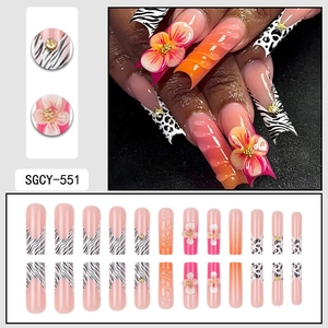 3D floral press-on nails with leopard zebra prints and textured wave patterns