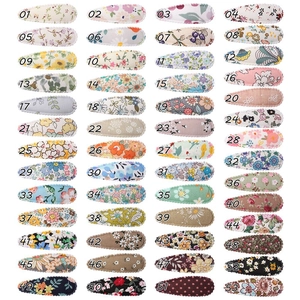Grille de 53 pinces à cheveux assorties en tissu avec motifs floraux et pois