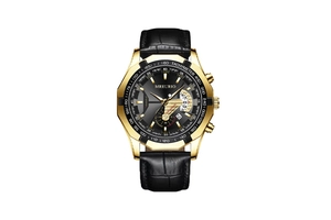 Detail of gold chronograph watch with black leather strap and tachymeter dial