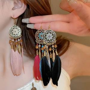 Bohemian feather drop earrings with round enamel disks in multiple vibrant colors
