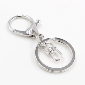 Macro shot of silver lobster clasp with 360-degree swivel ring for DIY keychains