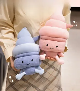 Detail of plush ice cream pillow toy with cute face embroidery held by a model