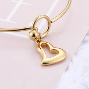 Minimalist gold heart pendant open bangle bracelet for women in Korean fashion style