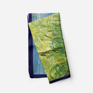 Detail of Van Gogh Wheat Field print silk scarf featuring premium texture and rolled edges