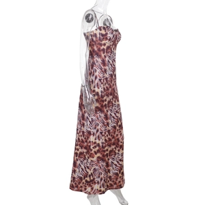 Side view of leopard print maxi dress showing the slim fit silhouette and sleek fabric