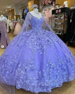 Detail of lavender purple ball gown with 3D butterfly appliqués and floral embroidery
