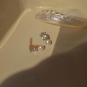 Elegant S925 silver 14K gold plated earrings with blue topaz and pearl on shell base